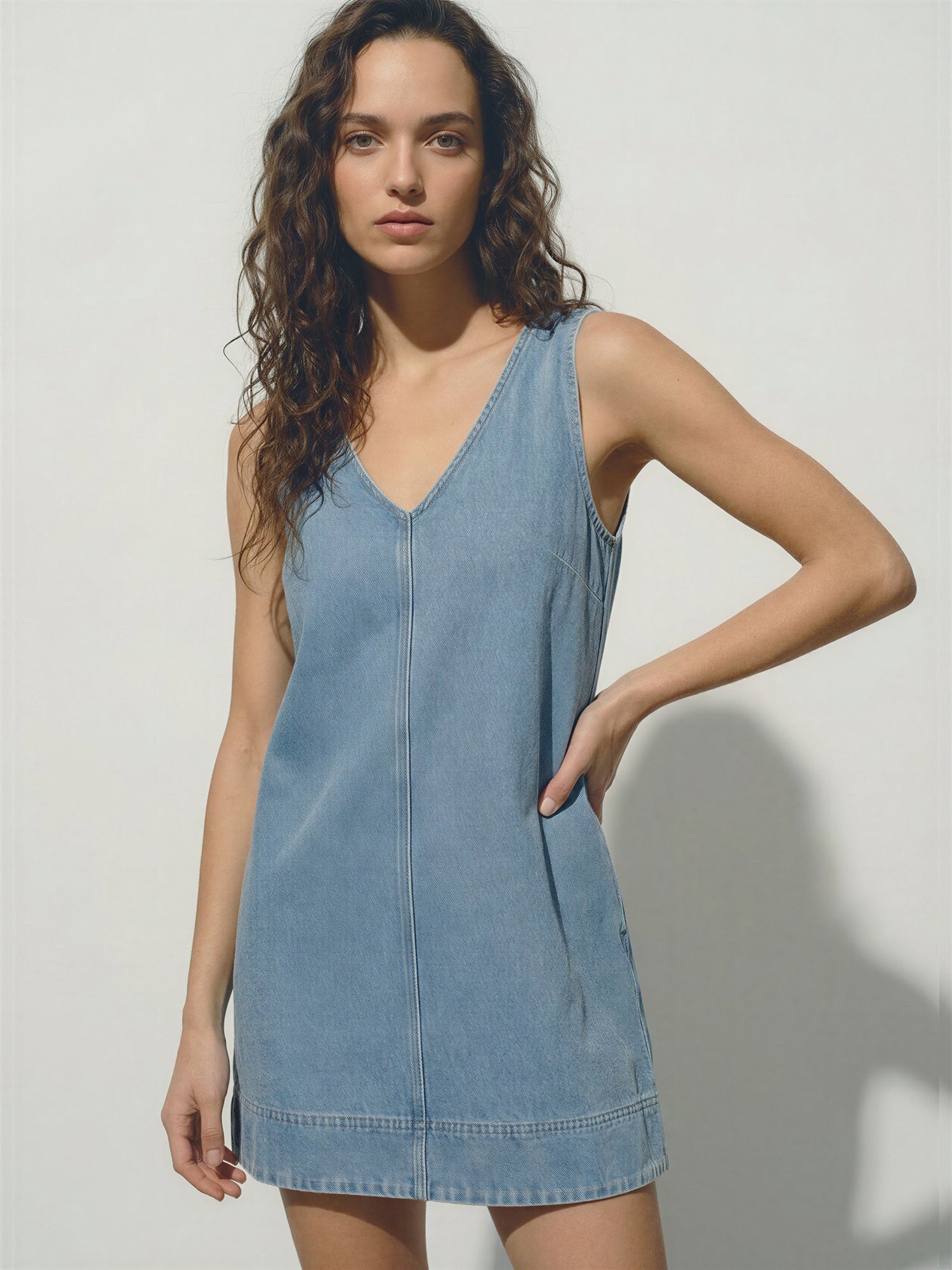 v neck denim dress Jessica V-Neck and relaxed chic looks. Izzy Denim Button Mini Dress