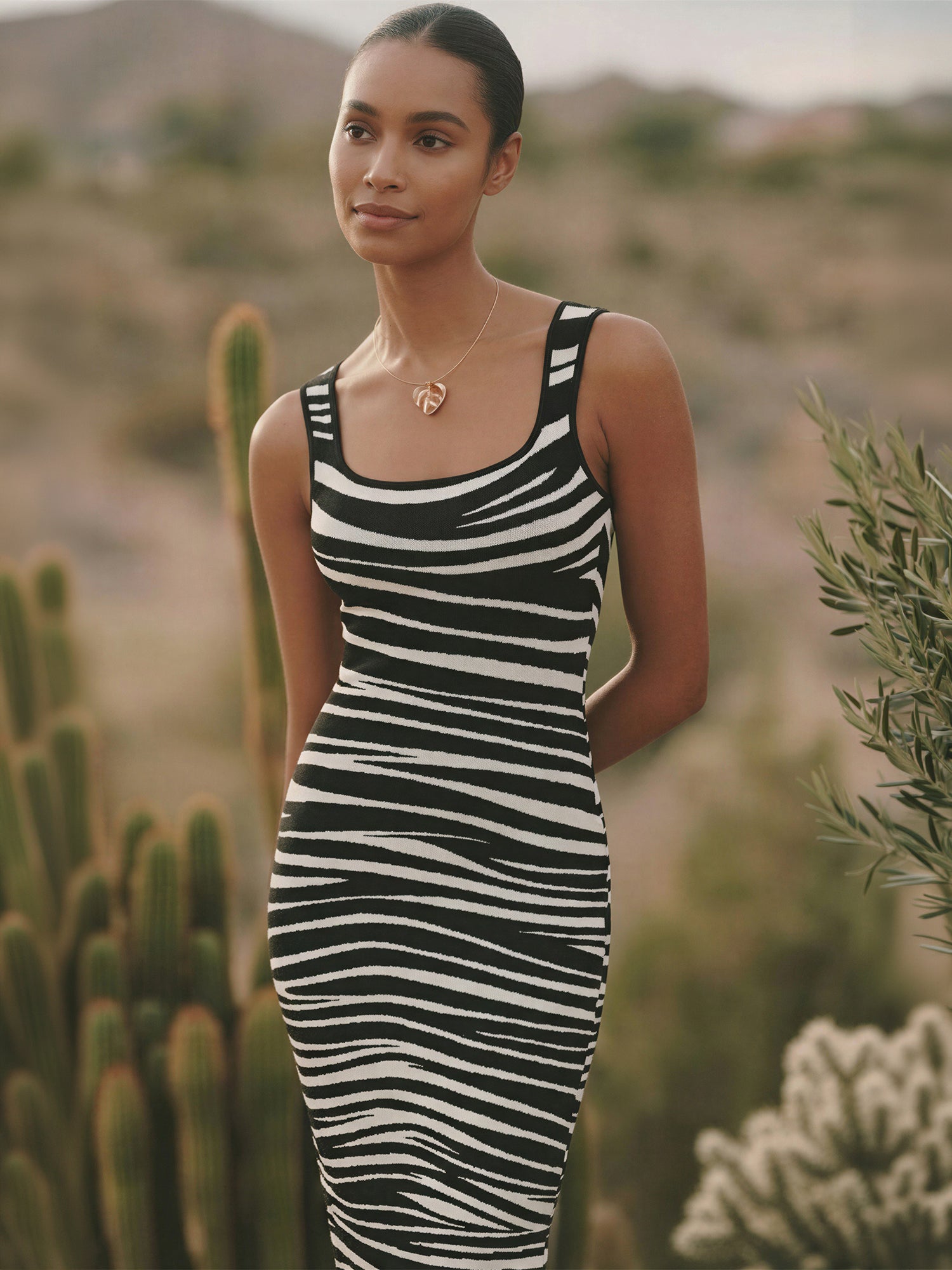 Sleeveless Zebra Print Knit Midi Dress – New York & Company